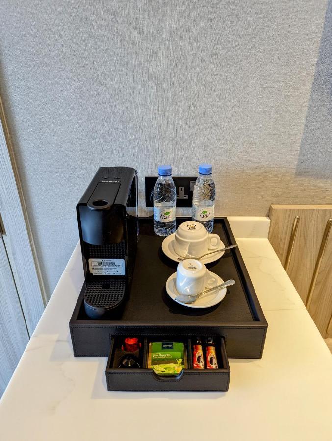 Citadines Abha Aparthotel Luaran gambar A Nespresso coffee machine in a hotel room