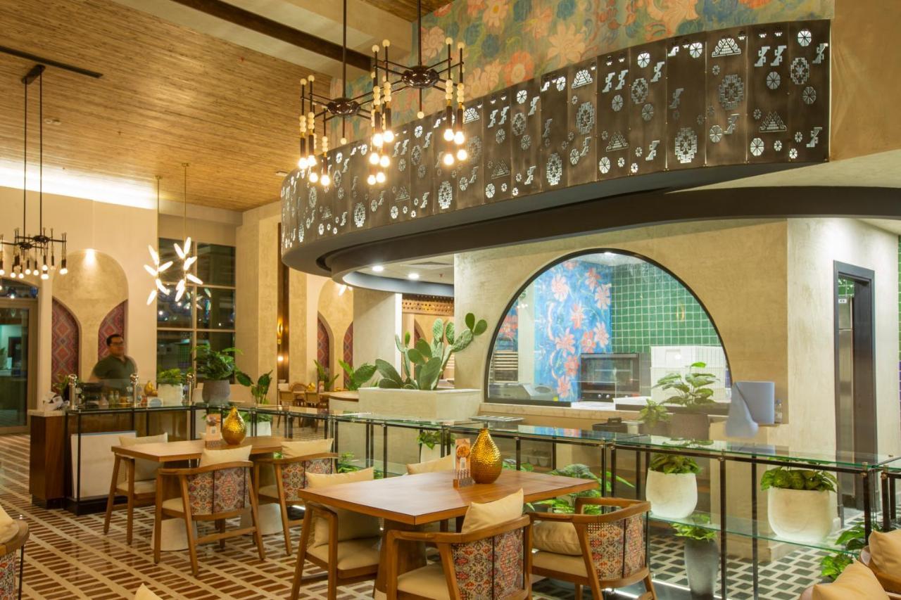 Citadines Abha Aparthotel Luaran gambar The interior of the restaurant